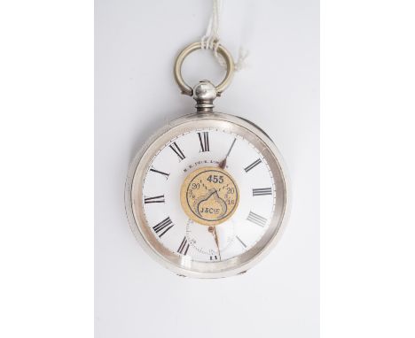 A late 19th Century Swiss white metal pocket watch retailed by H E Peck of London, having a white enamel face with Roman nume