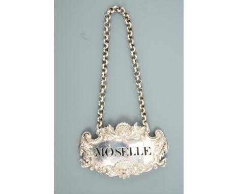 A Victorian Baroque silver bottle ticket for "Moselle", Charles Reily &amp; George Storer, London, 1845, 20.2g