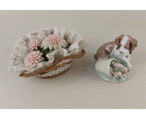 A Lladro Collectors Society porcelain model 7672 'It Wasn't Me!' of a puppy beside a pot of flowers 10cm high, boxed, togethe