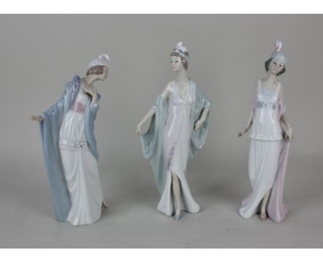 Three Lladro porcelain figures of 1920s ladies, 'BSophisticate', 'The Flirt', and 'Talk of the Town', tallest 27cm high, all 
