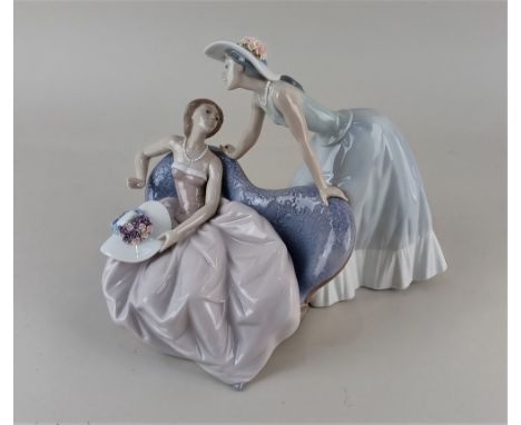 A Lladro porcelain figure group 5486 'Debutantes' of two ladies, one seated, approx 25cm high, boxed