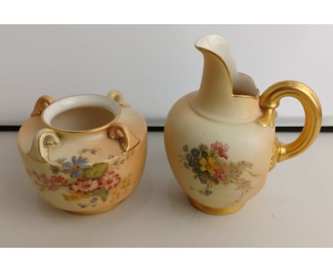 A Royal Worcester blush ivory porcelain flat back jug and small vase, both with floral decoration and gilt embellishments, ju