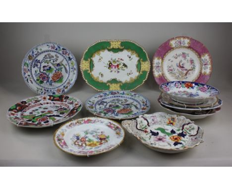 A collection of 19th century stoneware and ceramic plates, dishes and bowls, to include a Minton's pink cockatrice pattern bo