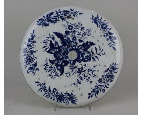 A Worcester blue and white porcelain circular drainer in pine cone pattern, verso paper label for Mercury Antiques 28cm diame