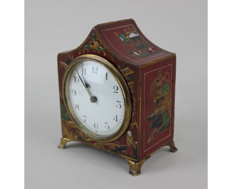 A Chinoiserie red lacquered mantle clock with circular white enamel dial, brass back plate stamped France, 15cm high