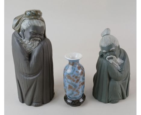 Two Lladro figures of 12056 'Tall Chinese' 21.5cm high, boxed, and 'Short Chinese' 17cm high, without box, together with a Ll