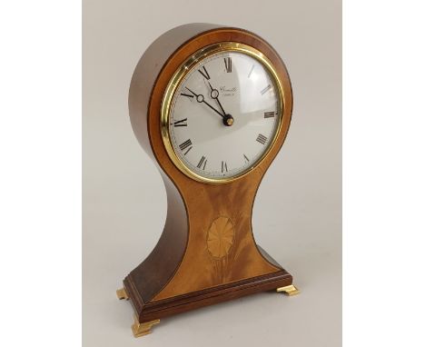 A modern mahogany veneered balloon mantle clock by Comitti of London, battery operated movement 26.5cm high