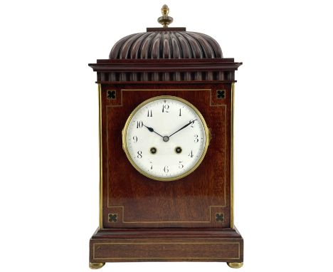 French - 19th- century 8-day Mahogany mantle clock with a carved pediment surmounted by a turned brass finial, flat top with 