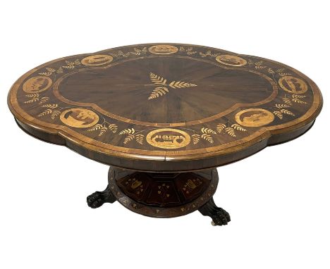 Mid-19th century Irish Killarney yew and arbutus wood breakfast table, the shaped tilt-top decorated with inlaid panels depic