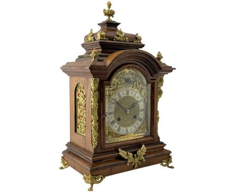 Reinhold Schneckenburger - German late 19th century 8-day mantle clock in a rosewood case, break arch pediment surmounted by 