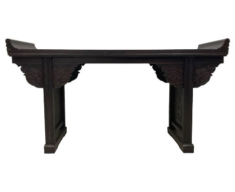 17th century design Chinese lacquered hardwood altar table, the rectangular top panel with swept cavetto everted ends over a 