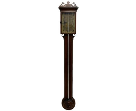 George III mercury stick barometer in an oak case - with an open carved fretwork pediment and glazed rectangular door with in