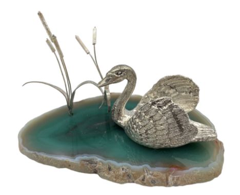 Modern silver model of a Swan swimming on a stylized agate slice pond amongst Bulrush, hallmarked Jon Braganza, London 2022 w