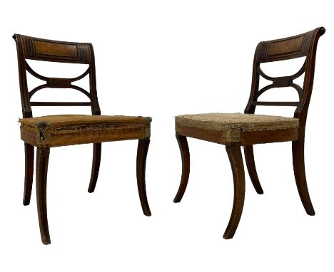 Pair of Regency mahogany chairs, the cresting rail inlaid with trailing geometric ebony banding and moulded figured panel, cu