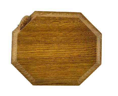 Mouseman - oak breadboard, canted rectangular form, the moulded edge carved with mouse signature, by the workshop of Robert T