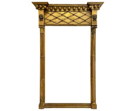 Regency gilt pier glass mirror, the projecting cornice with spherical mounts over applied lattice work with poppy heads, flan