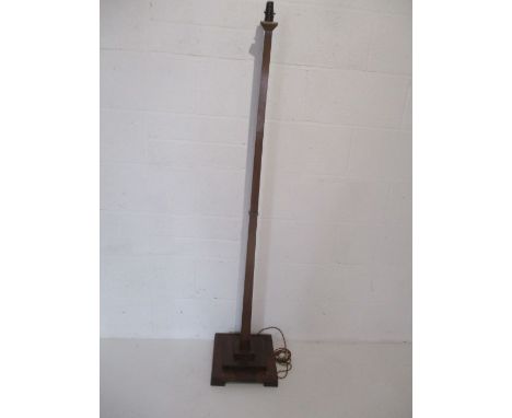 An Art Deco mahogany standard lamp.