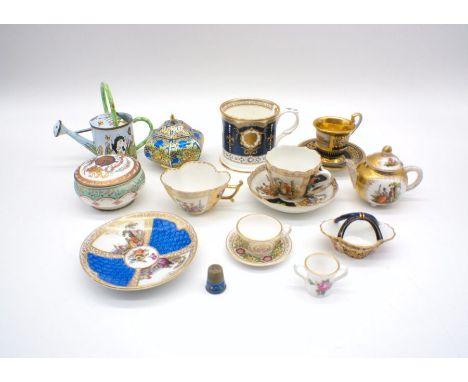 A mixed lot, comprising of various ceramic cabinet cups, including a Royal Crown Derby Imari pattern basket dish, a Meissen c