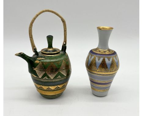 A small ceramic vase and teapot by Mary Rich both with geometric gilt design