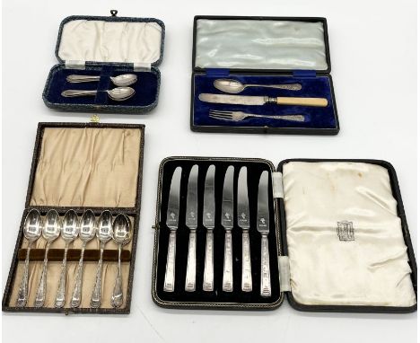 A set of cased silver handled knives along with various silver plated sets