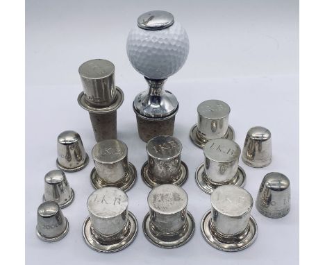 A collection of hallmarked silver bottle stoppers (most without corks) celebrating Isambard Kingdom Brunel (marked IKB) some 