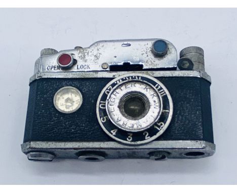 A KKW novelty miniature camera lighter with built in compass A/F