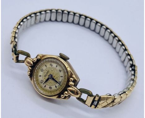 A 9ct gold ladies Rotary watch on expandable strap
