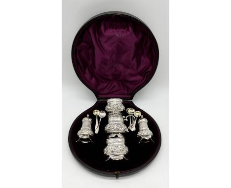 A cased hallmarked silver cruet set, Sheffield 1883 by Harrison Brothers &amp; Howson (3 mismatched spoons and pin missing fr