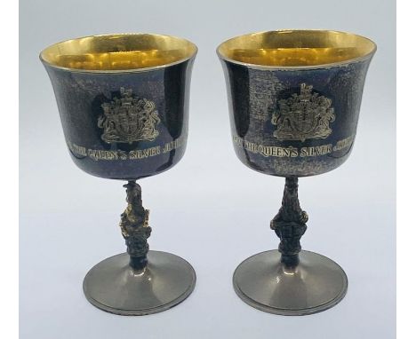 A pair of silver and parcel gilt goblets with Queens Beasts stems by Garrard &amp; Co, in celebration of Queen Elizabeth II S