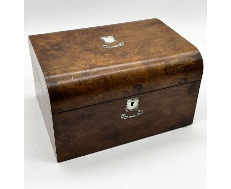 A mahogany dressing box with secret drawer, inlaid mother of pearl containing a number of silver plated dressing pots - inter