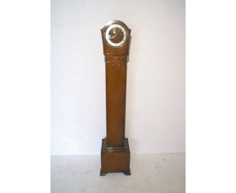 An oak cased grandmother clock.