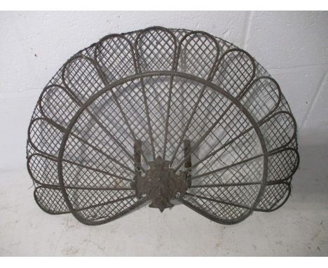 A Victorian peacock shaped brass fire screen by Evans &amp; Sons, London Bridge