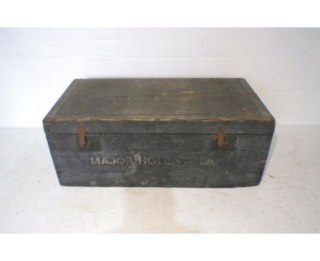 A black painted wooden storage trunk, with name 'Major Hollister' to front, length 98cm.