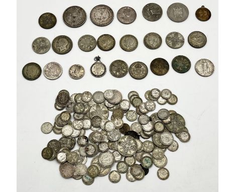 A collection of mainly silver coinage including two Morgan dollars, 3d's, florins etc. 