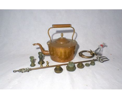 A copper kettle, along with a toasting fork, various weights etc.