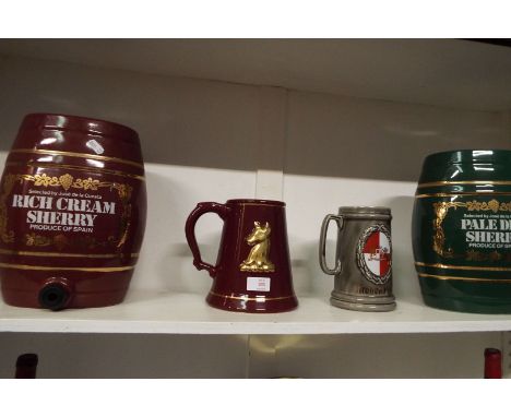 Two large ceramic Sherry barrels and two tankards