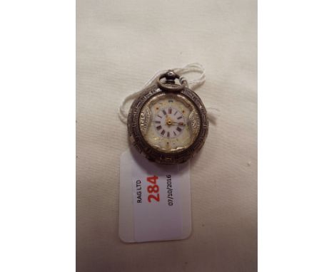 A 925 silver ladies fob watch having engraved decoration, enamel dial with Roman numerals