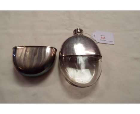 A silver-plated and glass hip flask