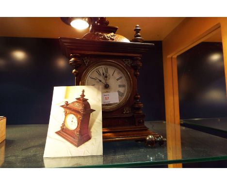 An oak cased Junghans mantle clock with alarm  Not currently working in need of a service