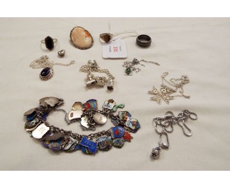 A quantity of silver jewellery to include enamel charm bracelet, rungs, cameo, bracelet and pendant