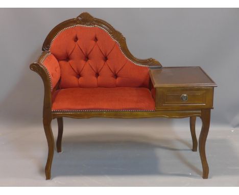 A mid 20th century button back telephone table, with red upholstery, H.86 W.94 D.43cm 