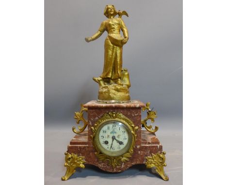 A late 19th century French variegated red marble and gilt metal mantle clock, drum movement (no pendulum), with gilt spelter 