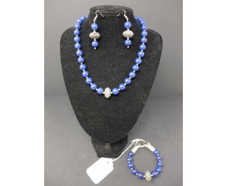 A set of lapis lazuli; beaded necklace, bangle and earrrings. 