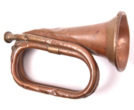 A WWII British army copper bugle, marked “21 PTC Besson &amp; Co, London 1940” and broad arrow. GC (rather battered)         