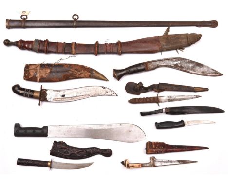 A Gurkha kukri; a West African sword in sheath; a machete, 5 other knives and a Vic sword scabbard. QGC to GC.               