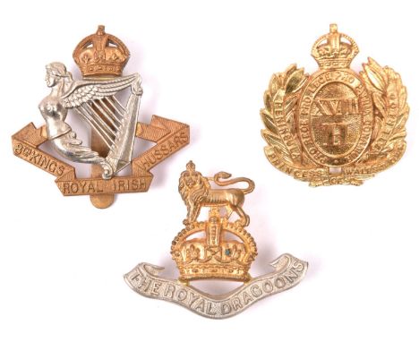  3 good OR’s cavalry cap badges: Royal Dragoons (751), 8th Royal Irish Hussars, slider marked “Lambourne Birmingham” WD and a