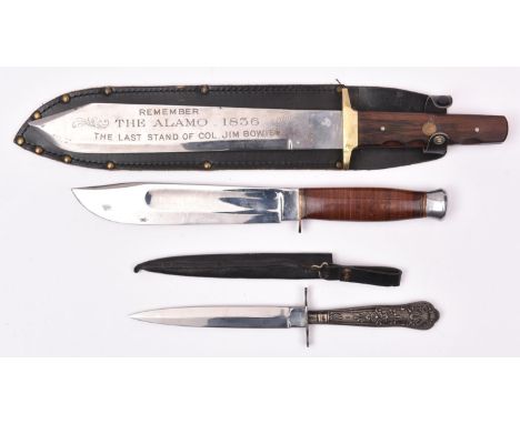 A large Bowie knife, blade 10½”  etched “Siege of the Alamo 1836 Col Jim Bowies last stand”, rosewood grip, in its black leat