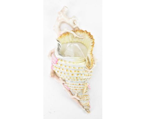 A late 19th century Royal Worcester wall pocket, circa 1880, in the form of a shell entwined with coral, marks to the base an