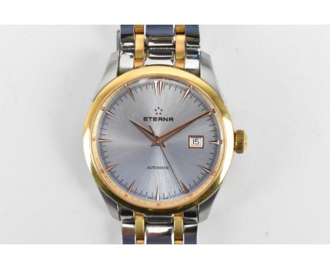 An Eterna, automatic, gents, stainless steel, bi-coloured wristwatch, having a silvered dial, centre seconds, date aperture a