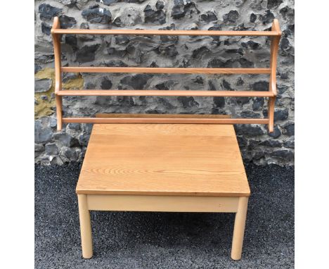 A vintage Ercol Windsor range light elm and beech square topped coffee table, raised on four cylindrical legs, 33cm high x 63